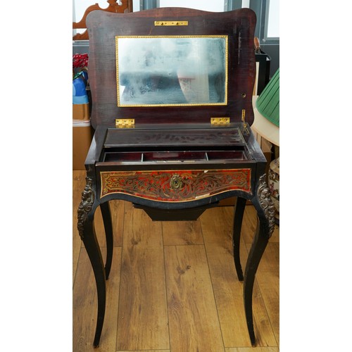 393 - A 19th Century French boulle dressing / work table, serpentine shape decorated with gilt metal and b... 