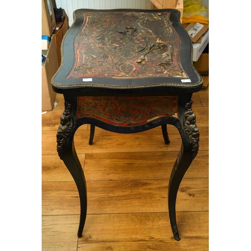 393 - A 19th Century French boulle dressing / work table, serpentine shape decorated with gilt metal and b... 