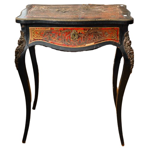 393 - A 19th Century French boulle dressing / work table, serpentine shape decorated with gilt metal and b... 