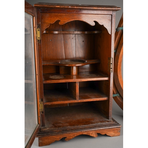 394 - An early 20th Century carved mahogany novelty coat wall rack in the form of a horse shoe with eight ... 