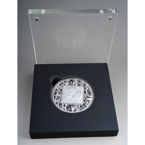 884 - 2021 Solomon Islands, a filigree Panda 2oz silver five-dollar coin, in presentation case and outer p... 