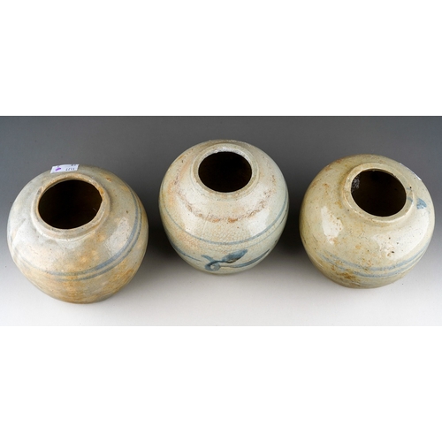 1009 - Three Provincial Chinese stoneware ginger jars., one with leaf decoration, one with hairline fractur... 