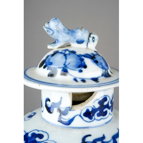 1010 - A Chinese blue and white baluster vase and cover, the body painted with a pair of four claw dragons ... 