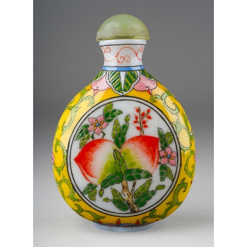 1014 - A second half 20th century Chinese opaque glass snuff bottle, decorated with fruit and scrolls, mark... 