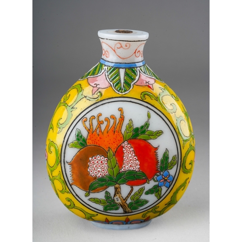 1014 - A second half 20th century Chinese opaque glass snuff bottle, decorated with fruit and scrolls, mark... 