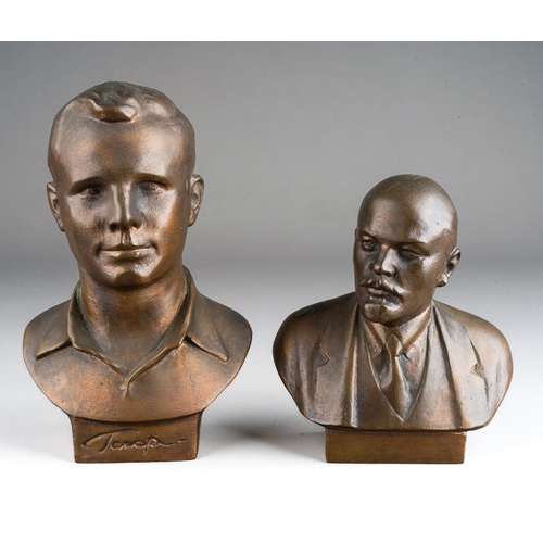 1032 - A bronzed metal bust of Yuri Gagarin and another of Lenin, signed and dated 1985 to reverse (2)