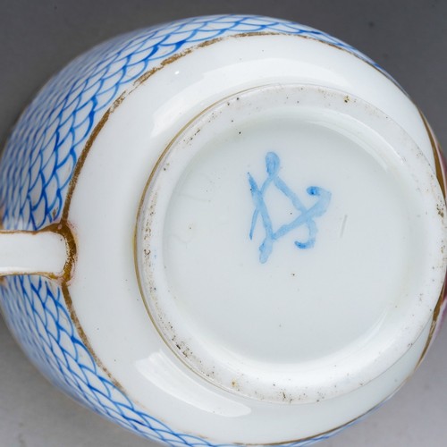 25 - A 19th century Sevres porcelain coffee cup, blue fish scale design with vignette of an exotic bird s... 