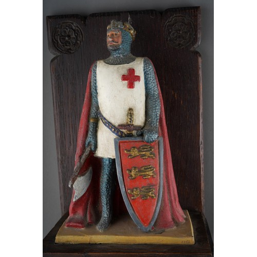 236 - Cast lead alloy figure of  English king (possibly Henry V) mounted on carved black forest carved wal... 