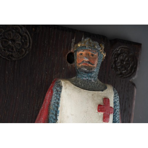 236 - Cast lead alloy figure of  English king (possibly Henry V) mounted on carved black forest carved wal... 