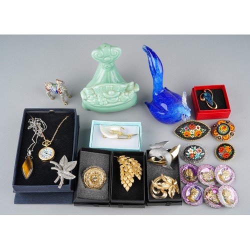 675 - Collection of costume jewellery to include brooches and 4 glass panels together with a blue glass Co... 