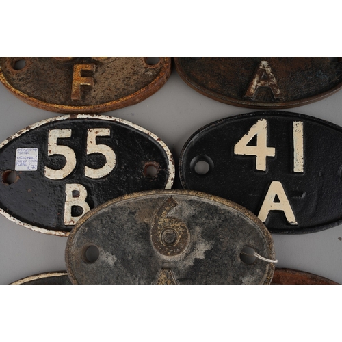 314 - Railway Interest: A collection of seven cast iron shed plates, comprising 83 F, 55 B, 55 H, 3 A, 41 ... 
