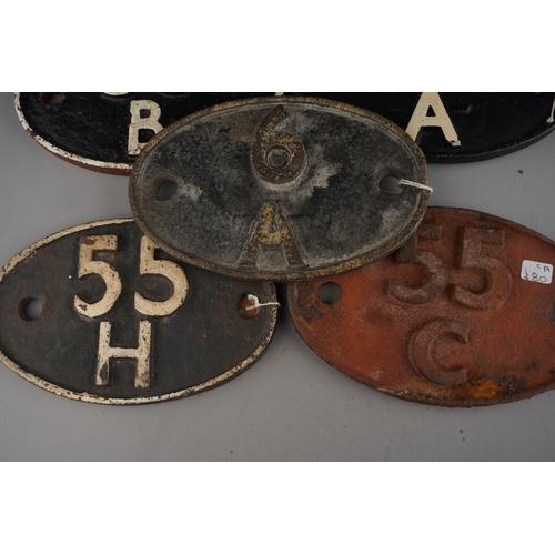 314 - Railway Interest: A collection of seven cast iron shed plates, comprising 83 F, 55 B, 55 H, 3 A, 41 ... 