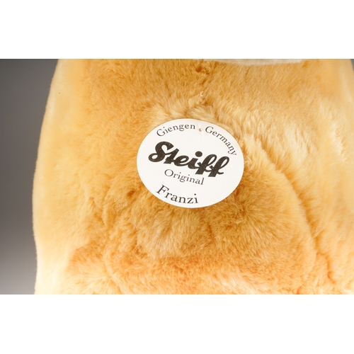 A Modern Steiff Franzi Rocking Horse, blonde plush with button and ...