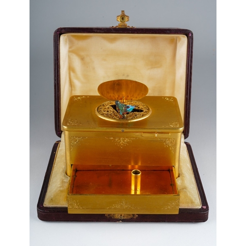 Antique singing bird box in leather casket C. 1910 in date, retailed by Finnegans of Bond Street, London.  Original key