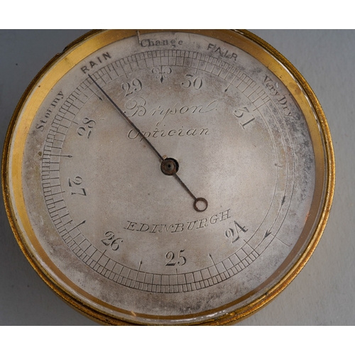 539 - A 19th Century brass cased pocket barometer by Bryson Optician, Edinburgh with silvered dial, the en... 