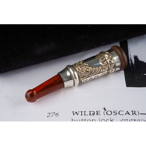 Oscar Wilde Interest: a late Victorian silver mounted cigarette holder,  embossed with foliate scroll