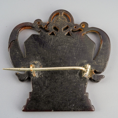593 - An early 19th century tortoiseshell pique brooch. Approx length 45mm, gross weight 8.35 grams.
