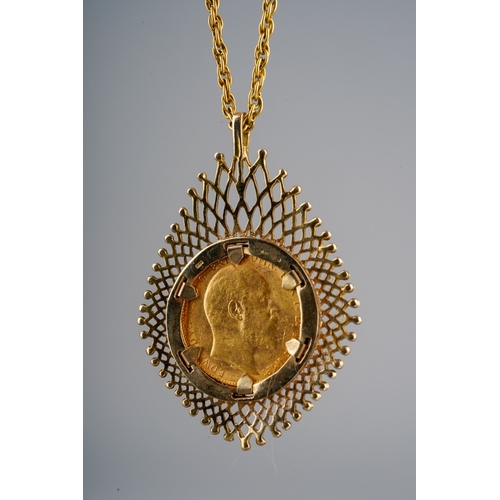 726 - 1908 full Sovereign in large 9 ct gold mount on a yellow metal chain, total gross weight approx. 21.... 