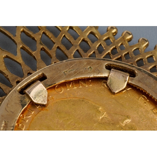 726 - 1908 full Sovereign in large 9 ct gold mount on a yellow metal chain, total gross weight approx. 21.... 