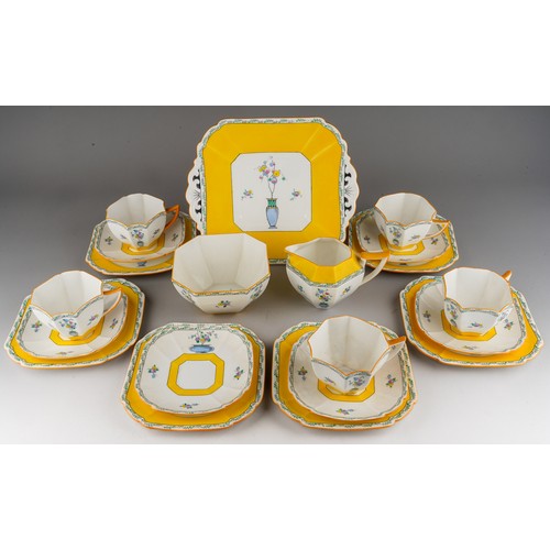 98 - A Shelley  Art Deco tea set in yellow, decorated with urns and flowers, RD number 723404 pattern 116... 