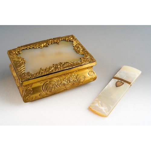 A mid 19th century gilt metal rectangular table snuff box, the hinged ...