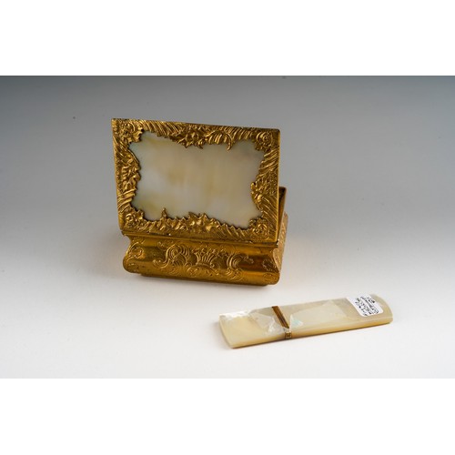 A mid 19th century gilt metal rectangular table snuff box, the hinged ...
