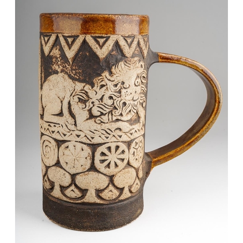 A Quantock pottery tankard, with Lion and motif impressed decoration ...