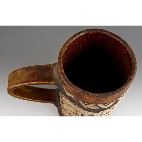 A Quantock pottery tankard, with Lion and motif impressed decoration ...