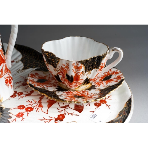 8 - A Wileman & Co Foley China cabaret set, Rd no.84175 and Rd60650, comprising wavy rimmed tray, teapot... 