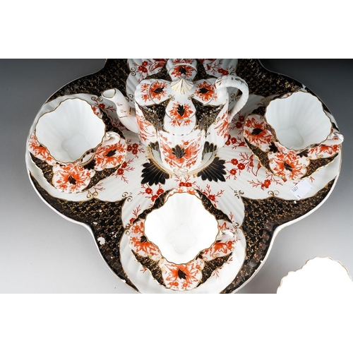 8 - A Wileman & Co Foley China cabaret set, Rd no.84175 and Rd60650, comprising wavy rimmed tray, teapot... 