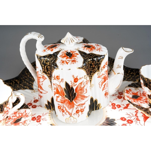 8 - A Wileman & Co Foley China cabaret set, Rd no.84175 and Rd60650, comprising wavy rimmed tray, teapot... 