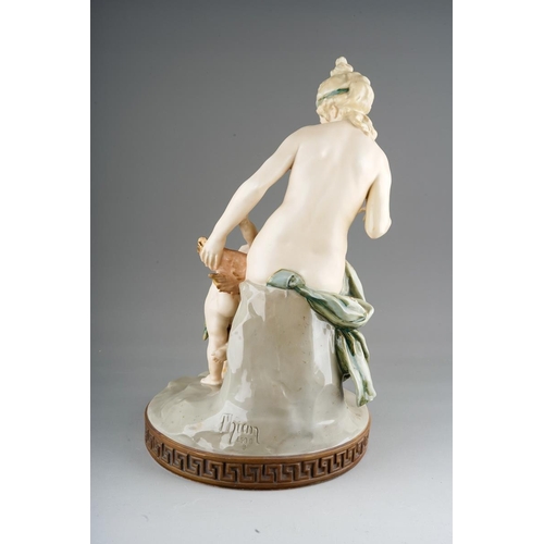 16 - An Austrian Ernst Wahliss Turn Wien centrepiece, circa 1900,modelled as The Disarming of Cupid., the... 