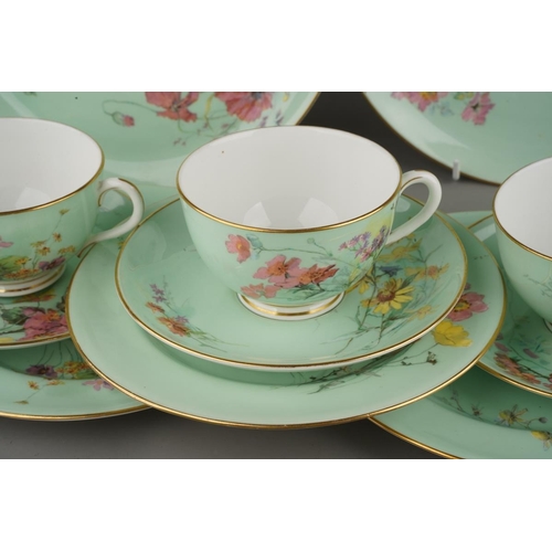 31 - A Royal Worcester twelve place tea set comprising cups, saucer and plates together with two cake pla... 