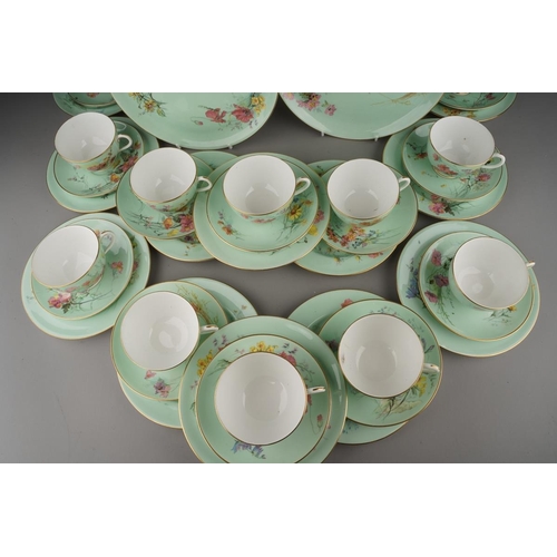 31 - A Royal Worcester twelve place tea set comprising cups, saucer and plates together with two cake pla... 