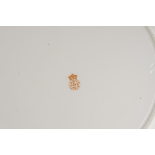 31 - A Royal Worcester twelve place tea set comprising cups, saucer and plates together with two cake pla... 