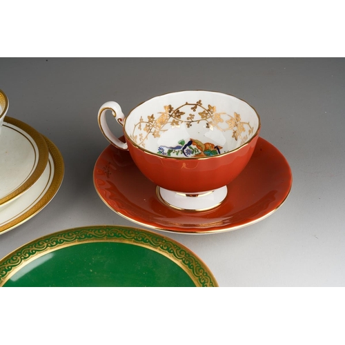 34 - A handpainted Brookdale coffee cup and saucer decorated with fruit and cobalt borders, signed J Mott... 