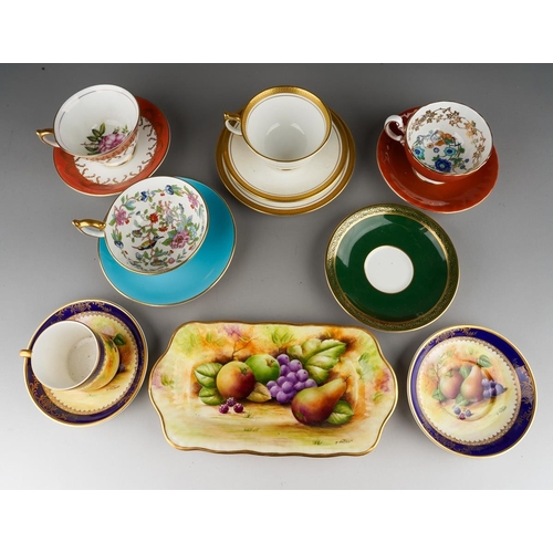 34 - A handpainted Brookdale coffee cup and saucer decorated with fruit and cobalt borders, signed J Mott... 