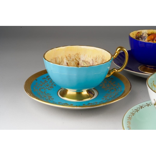 35 - Four Aynsley cups and saucers to include: pattern no 2832, gilt scrolls on turquoise ground with Aut... 