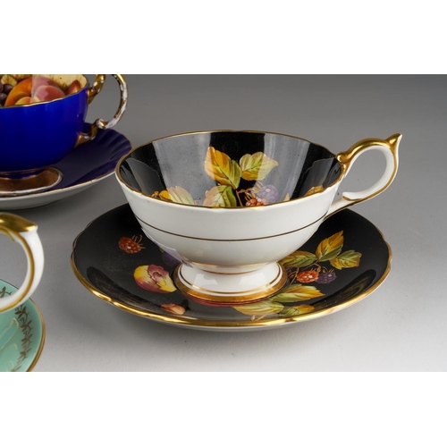 35 - Four Aynsley cups and saucers to include: pattern no 2832, gilt scrolls on turquoise ground with Aut... 