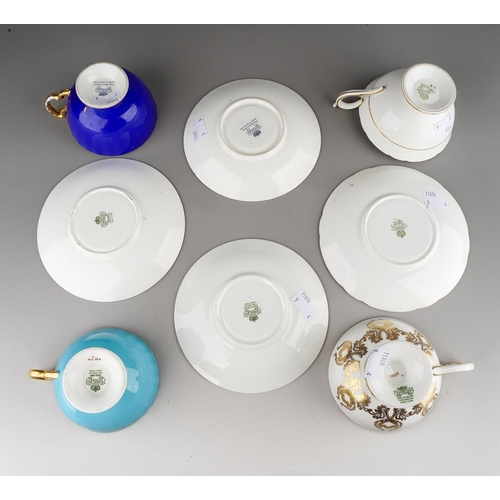 35 - Four Aynsley cups and saucers to include: pattern no 2832, gilt scrolls on turquoise ground with Aut... 