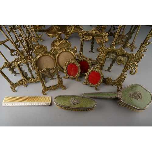 A box of Victorian style decorative reproduction brass frames, dressing ...