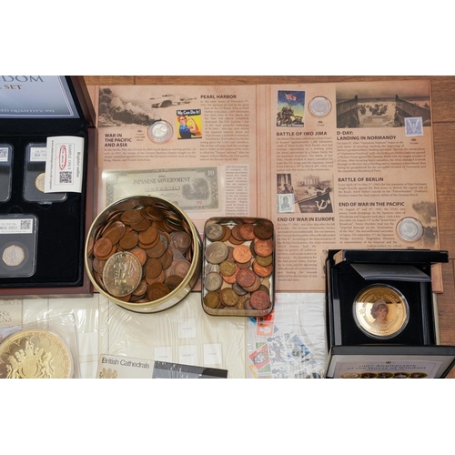 1106 - A box of assorted commemorative and circulated  coins and stamps, in presentation packs and loose, i... 