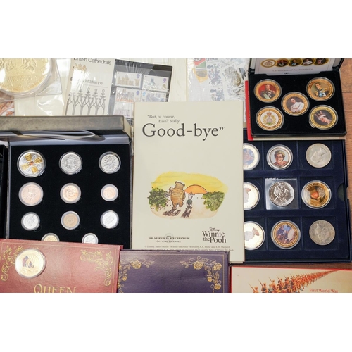 1106 - A box of assorted commemorative and circulated  coins and stamps, in presentation packs and loose, i... 
