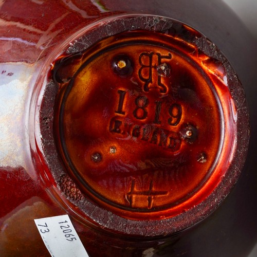 21A - A Burmantofts red glazed twin handled vase and cover, pattern no.1819, impressed marks, height 26cm,... 