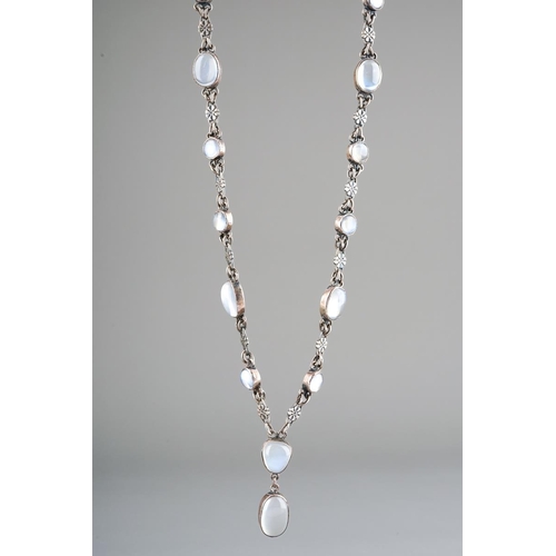 A silver and moonstone necklace, set with fifty one oval moonstones, flowerhead shaped links, no clasps, unmarked, length from neck to drop 64cm