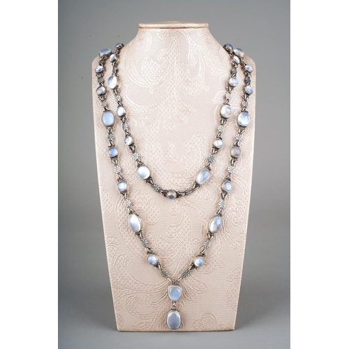 92 - A silver and moonstone necklace, set with fifty one oval moonstones, flowerhead shaped links, no cla... 