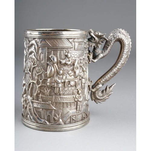 A late 19th/early 20th Century Chinese Export silver tapering mug with cast four claw dragon handle, the entire body chased with bamboo, multiple figures, cattle, scholars within pagoda., stamped to underside, weight approx 128.5 grams. Height approx 7cm, diameter of base approx 5.5cm and diameter of top, approx 5cm [1]