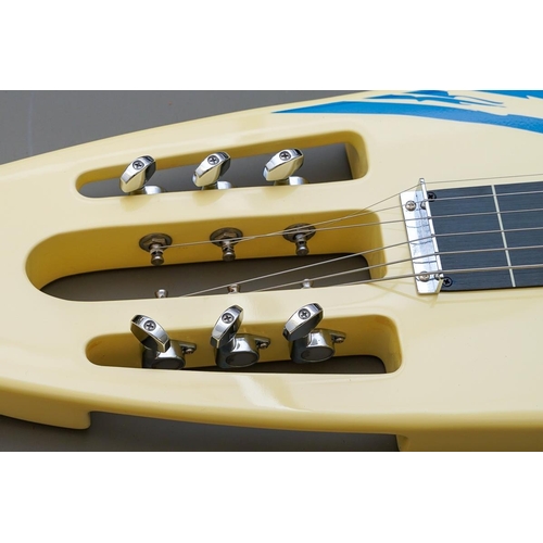 335 - A Chinese made Mahalo Hawaiian surf board style six string Lap steel guitar, with legs, in branded s... 