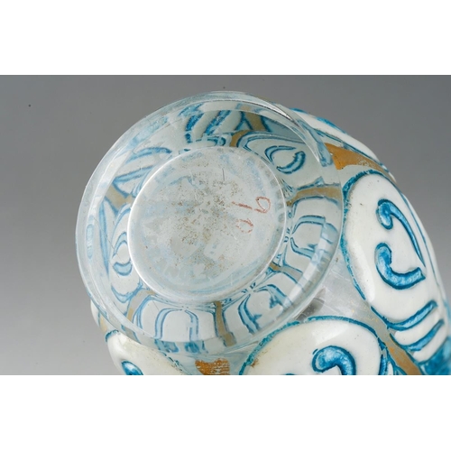 587 - An early 20th century Baccarat glass and enamel scent bottle in the form of an Egyptian Alabastron, ... 