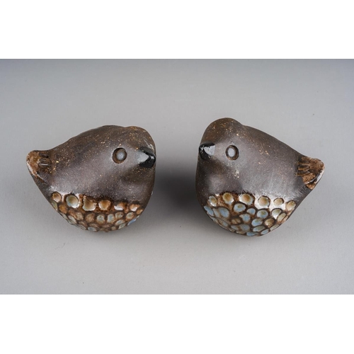 614 - A pair of Mid-Century Swedish pottery birds in blue and brown with feather detailing designed by Ben... 